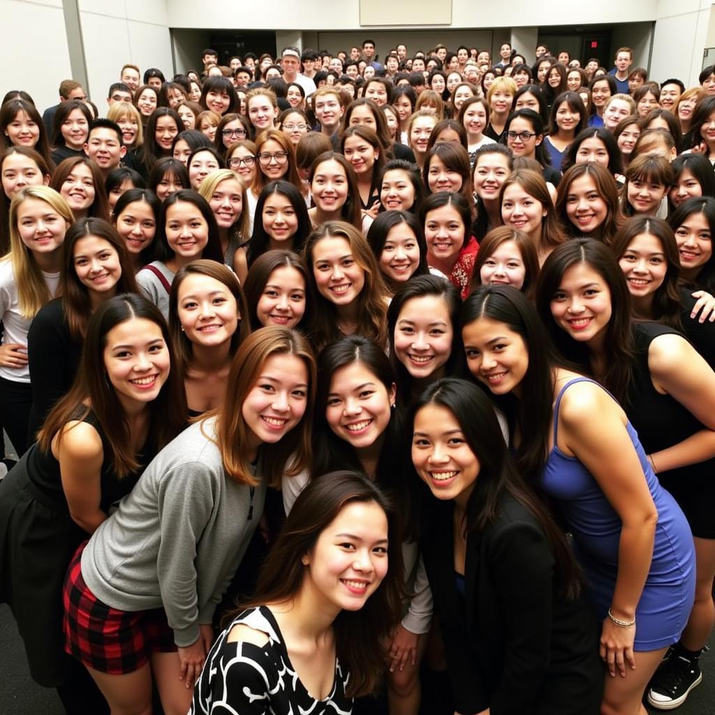 After School posing for a group photo with fans at their 2013 fan meeting