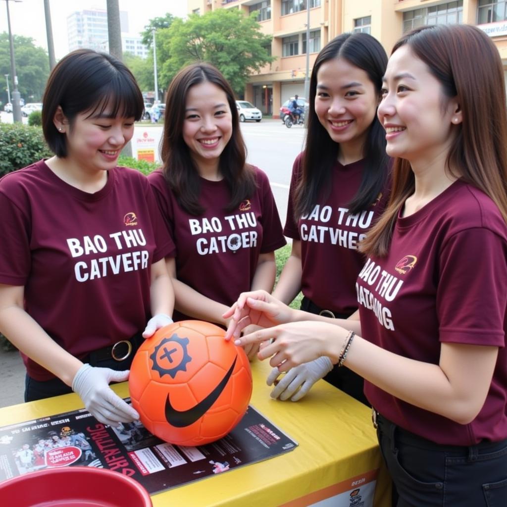 Bao Thu fan club members participating in a charity event