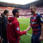 Barcelona and Real Madrid fans shaking hands