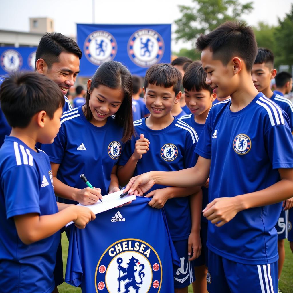 Chelsea FC players engaging with Vietnamese fans during a community outreach event.