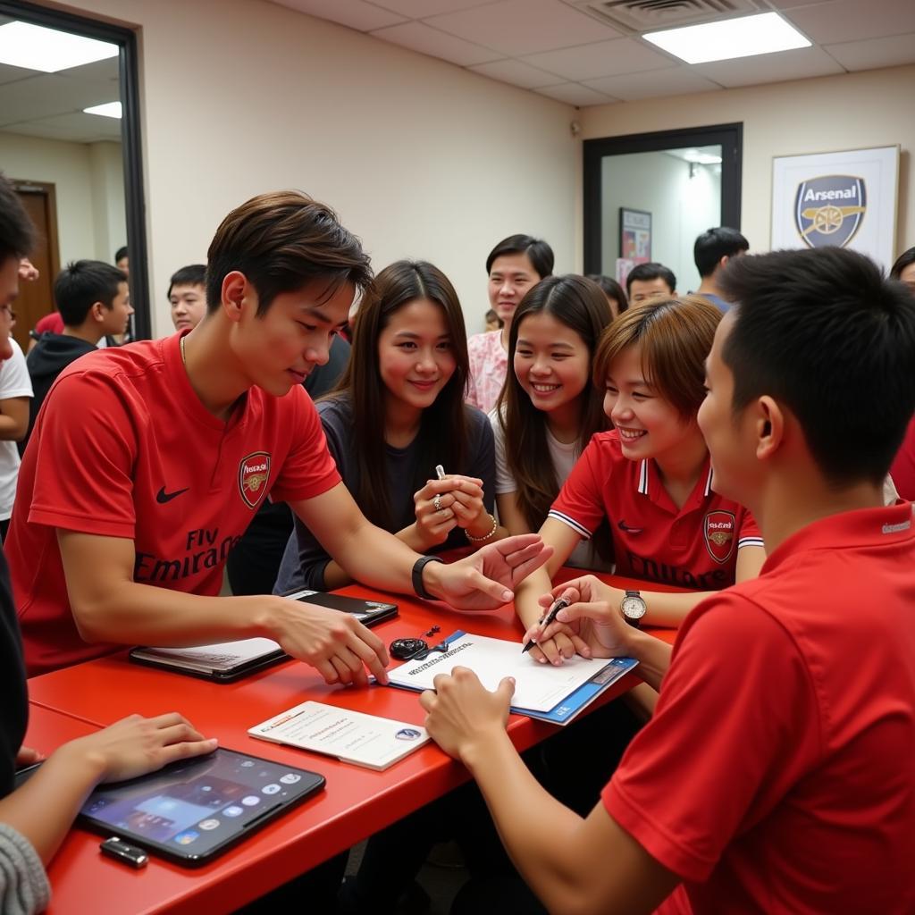 Đình Trọng interacting with Arsenal fans in Vietnam