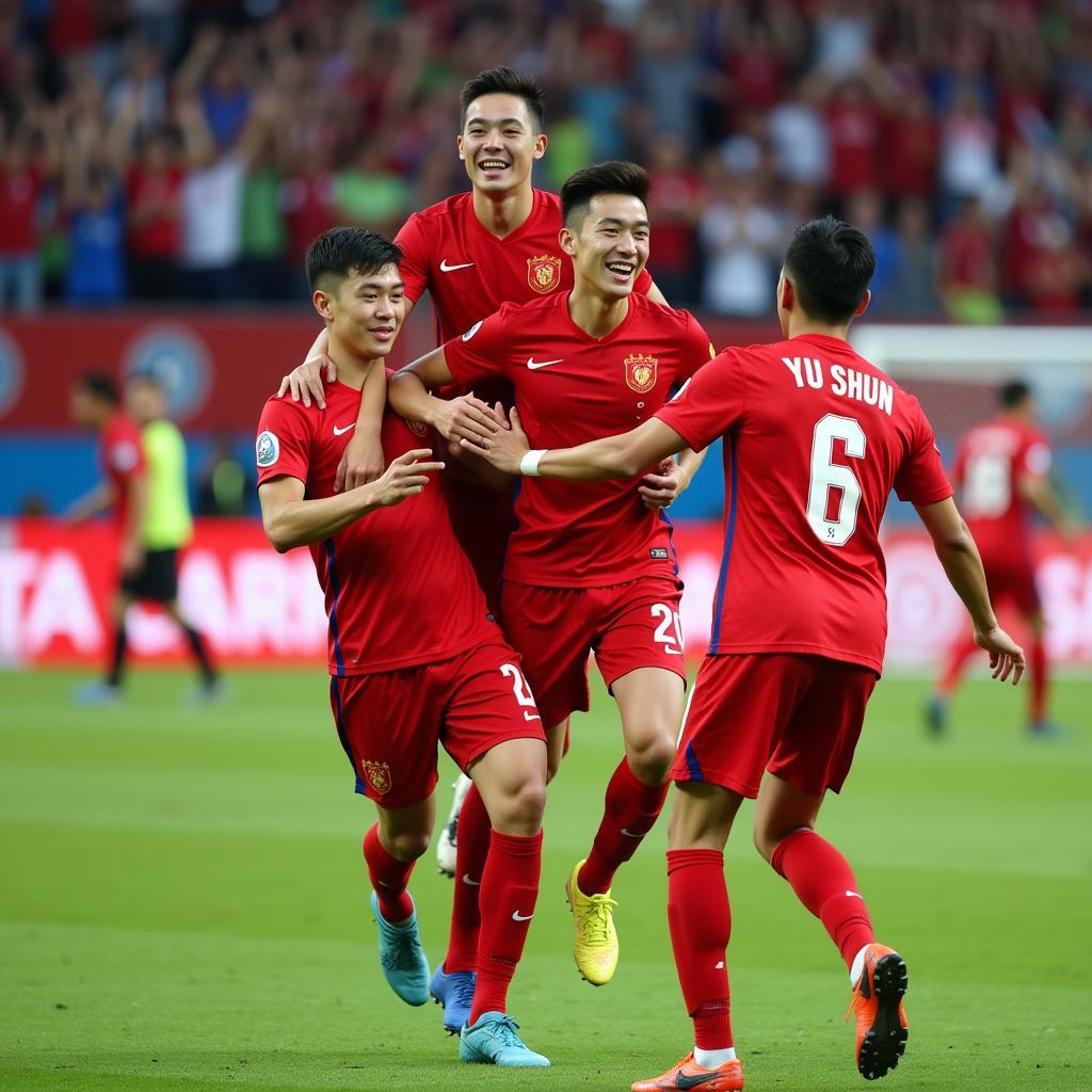 Fan Yu Shun celebrating a goal with teammates