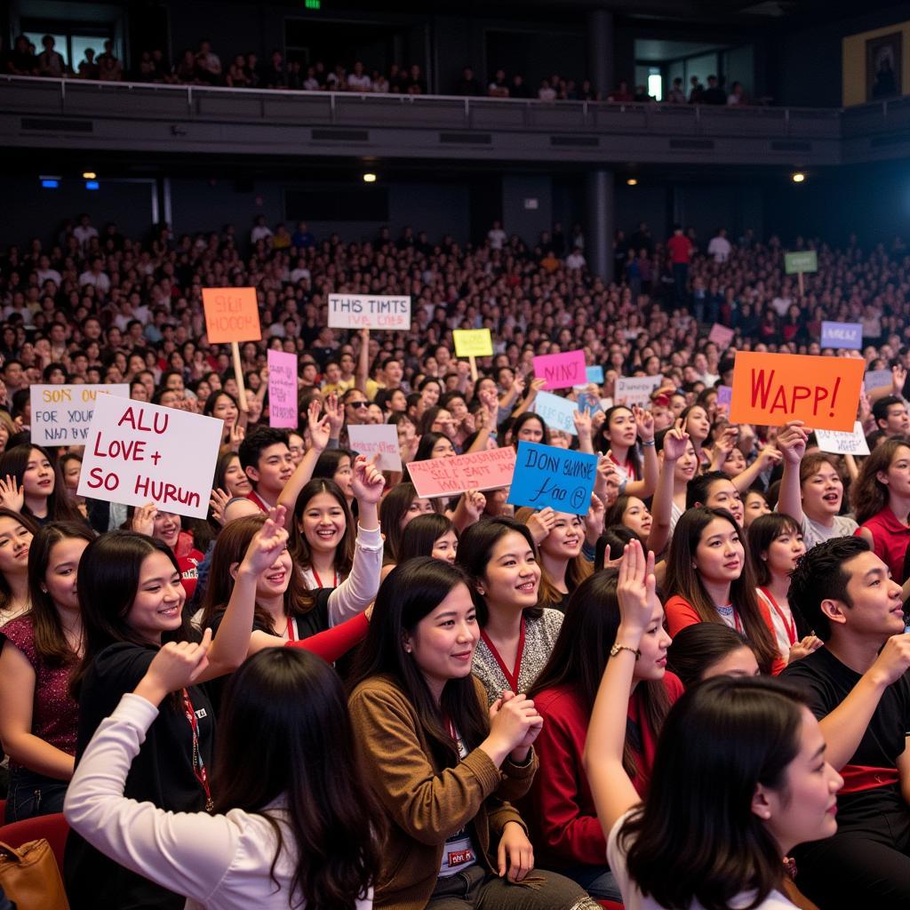 Fans holding up banners at Kim So Hyun's fan meeting