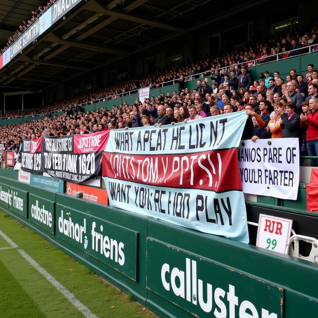 Fans holding banners promoting respect and fair play