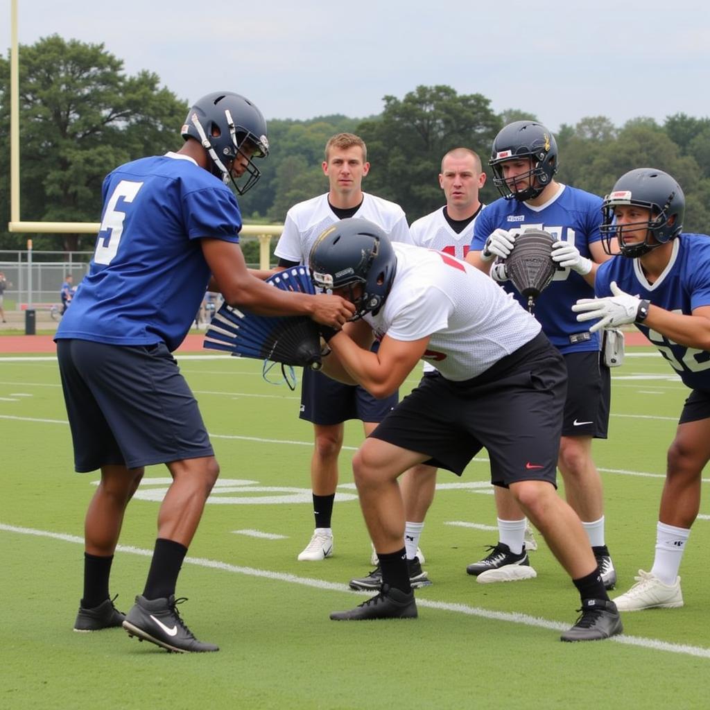 Football Team Practicing Fan Wrapping Drill