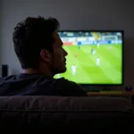 Frustrated Football Fan Watching TV