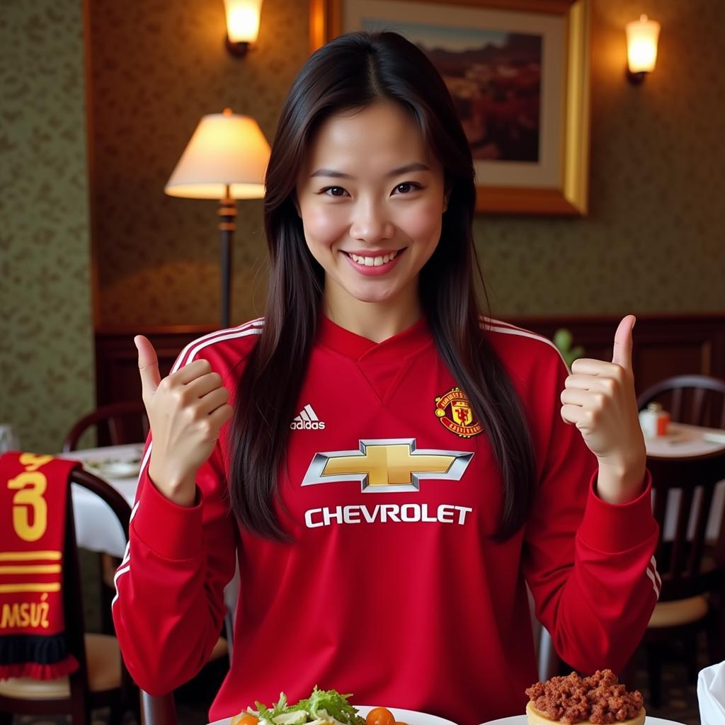 Vietnamese food blogger Hà Linh in a Manchester United jersey