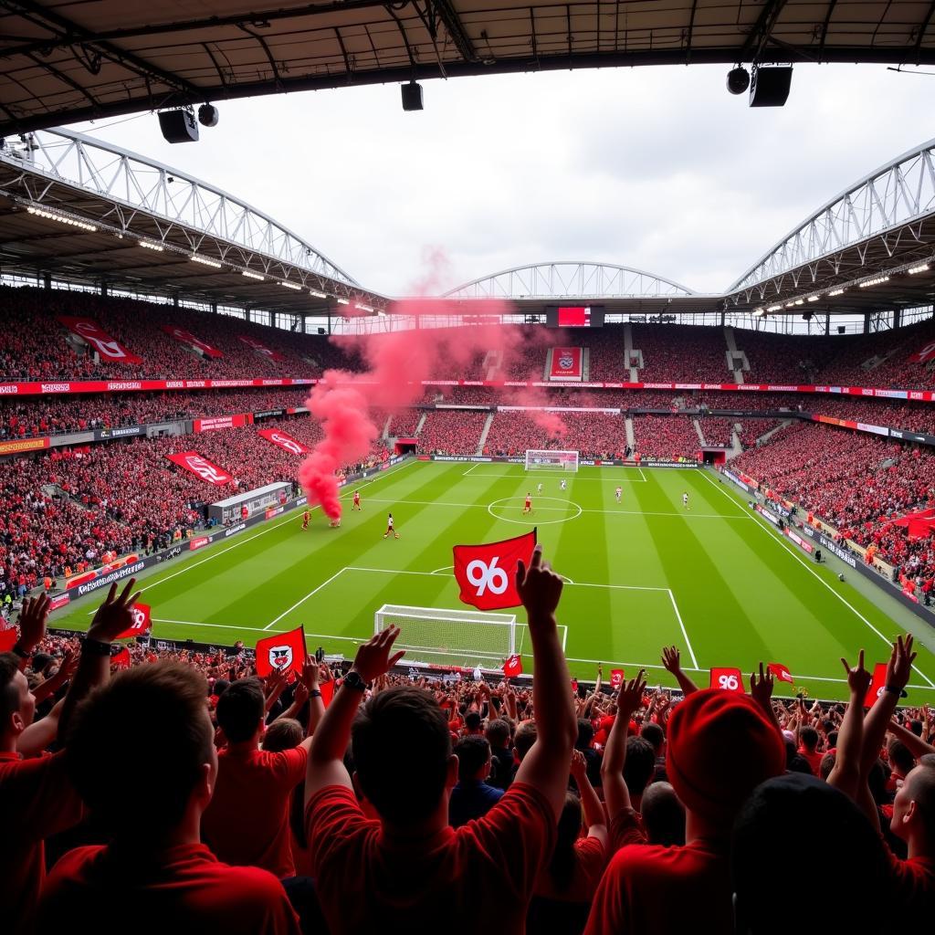 Hannover 96 fans celebrating a goal inside the HDI Arena