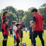 Hatano players at a youth coaching clinic