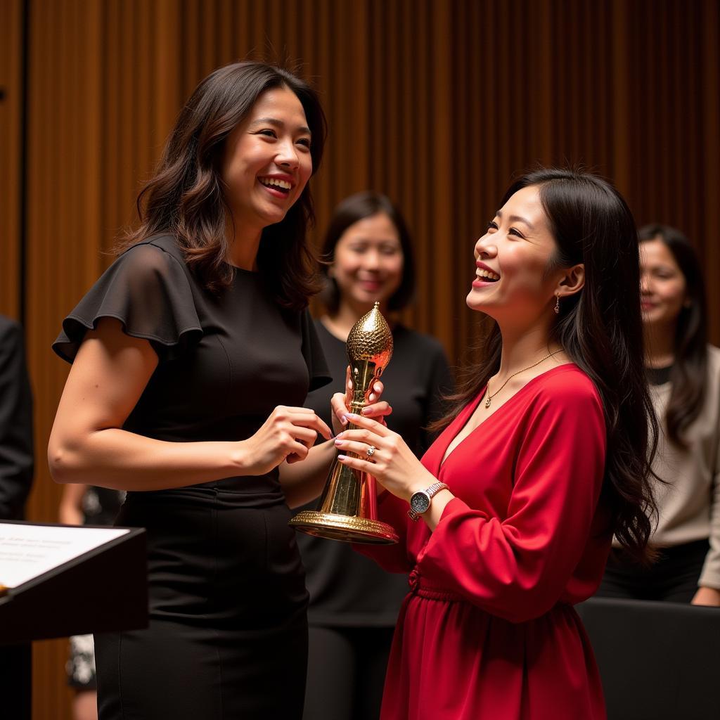 Hương Tràm receiving a prestigious music award, acknowledging her talent and impact on the music industry.