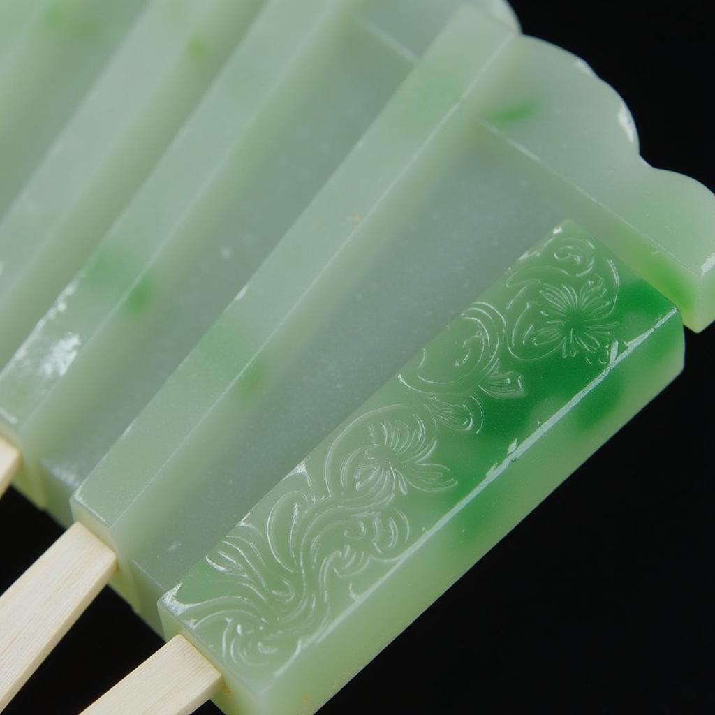 Intricate jade fan carving