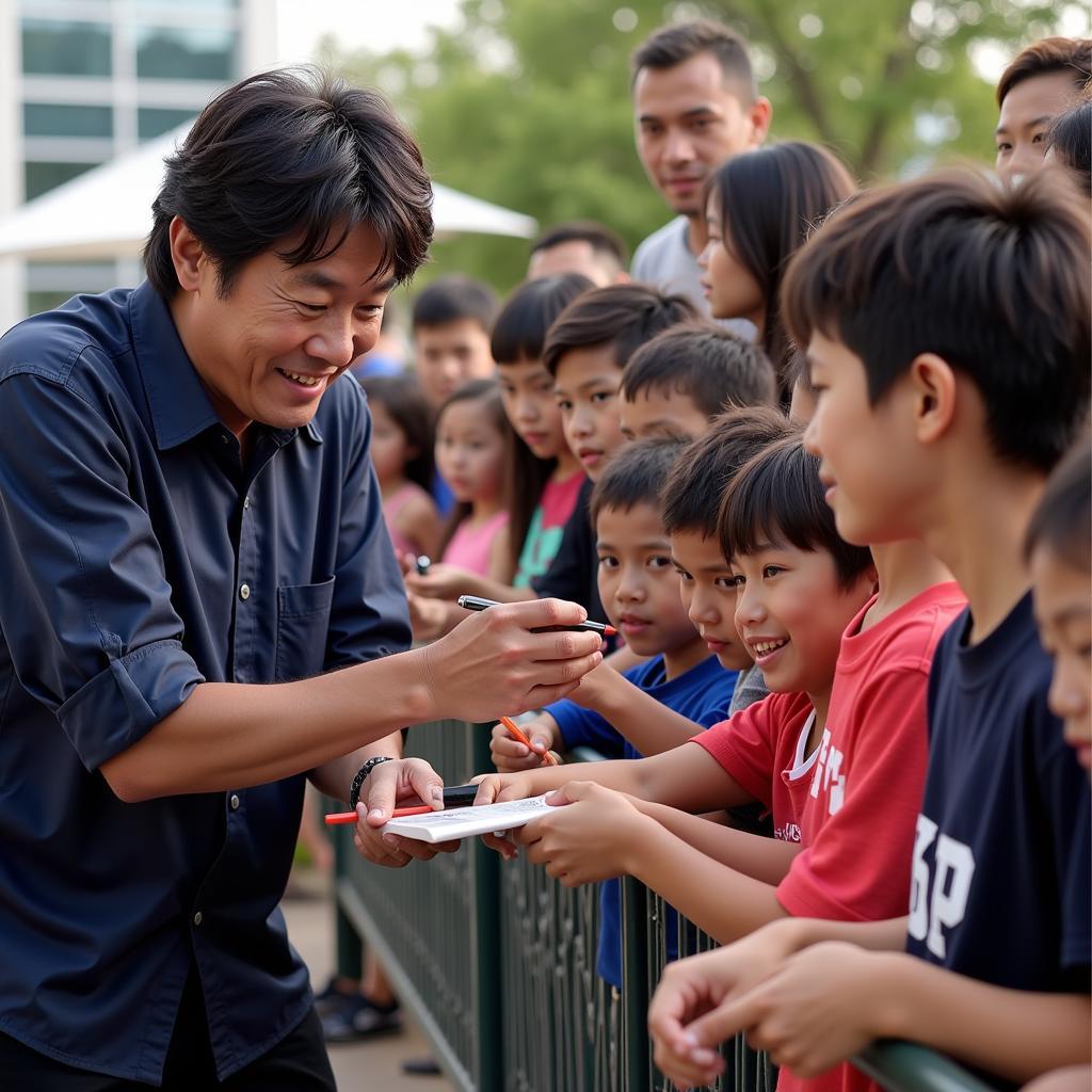 Koga interacts with fans