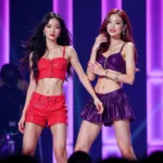 BLACKPINK's Lisa and Jennie performing on stage