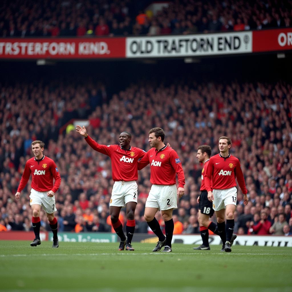 Manchester United players celebrating a goal in front of a packed Old Trafford