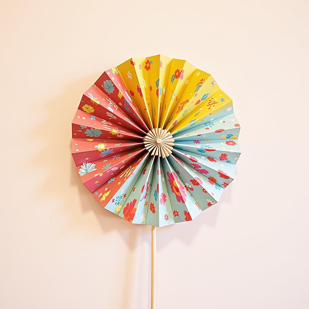 A finished rotating paper fan spinning