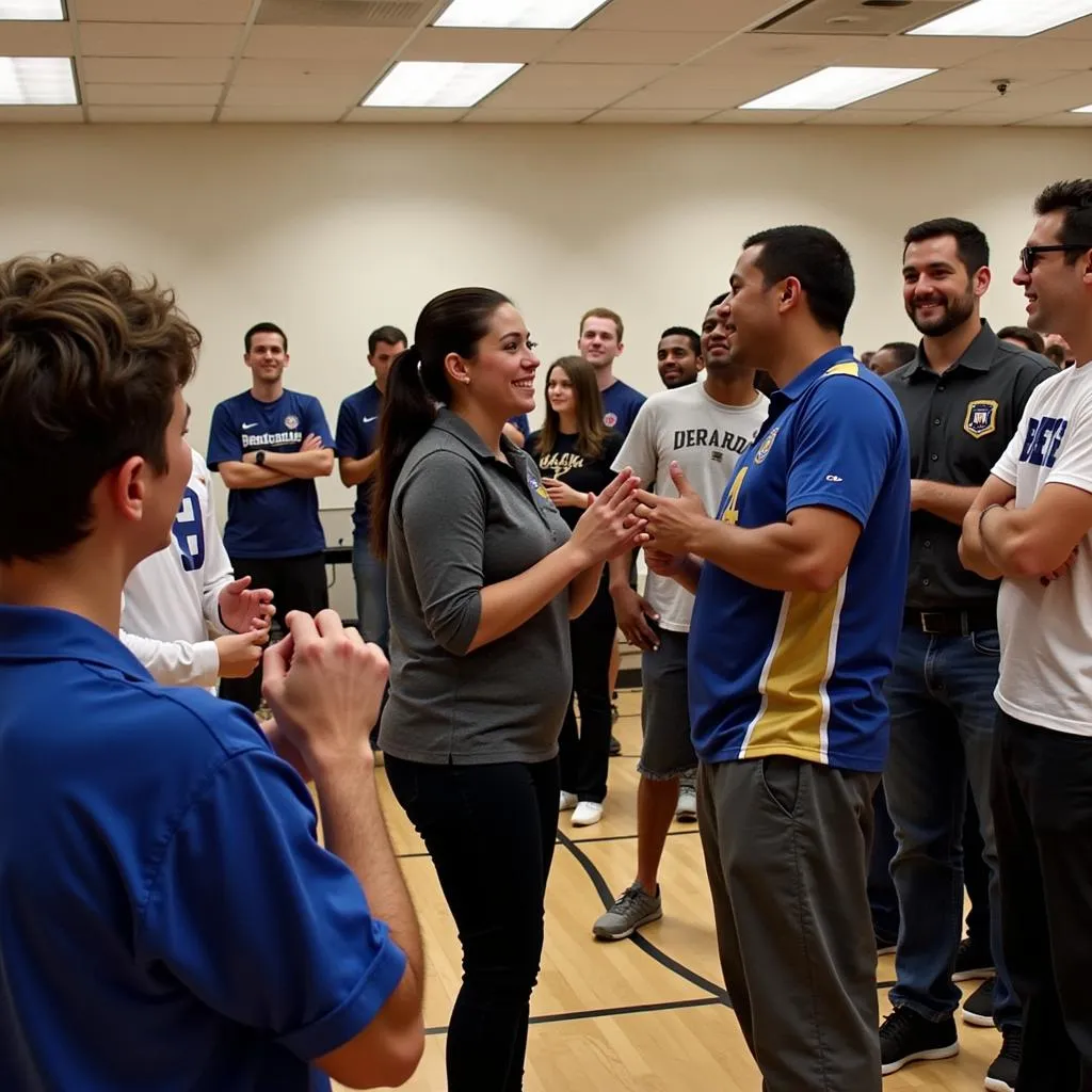 Speaker interacting with soccer fans at a fan meeting