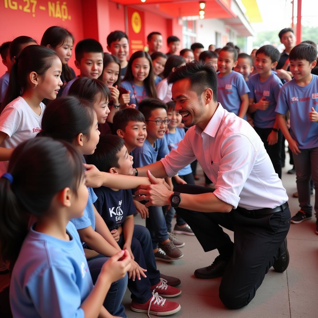 Bùi Tiến Dũng interacting with young fans at a community event