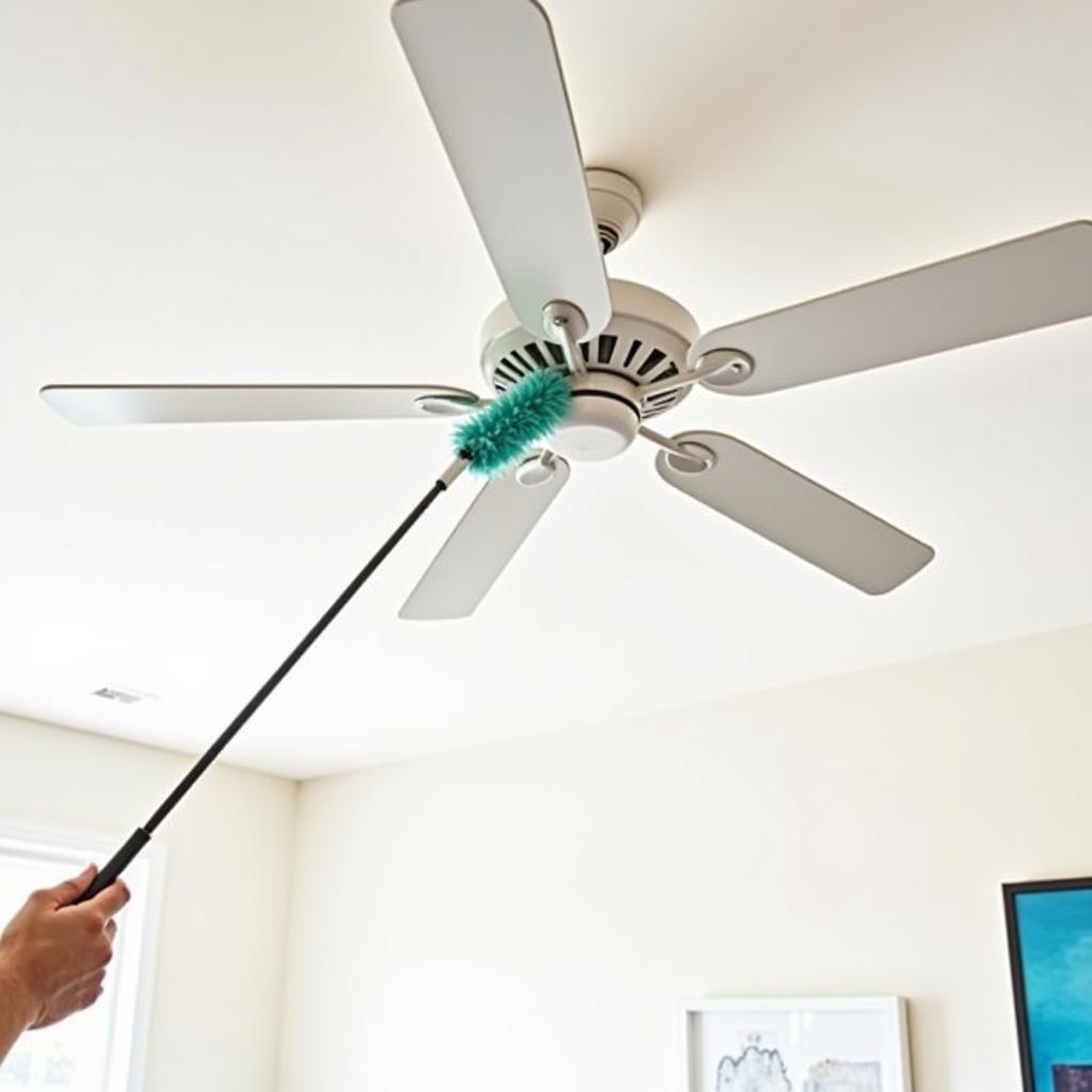 Cleaning a ceiling fan with an extendable duster