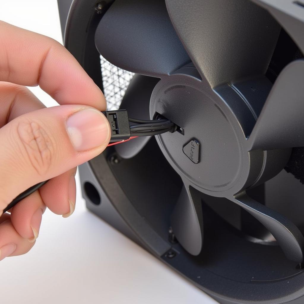 Disconnecting the LED power cable from a PC fan