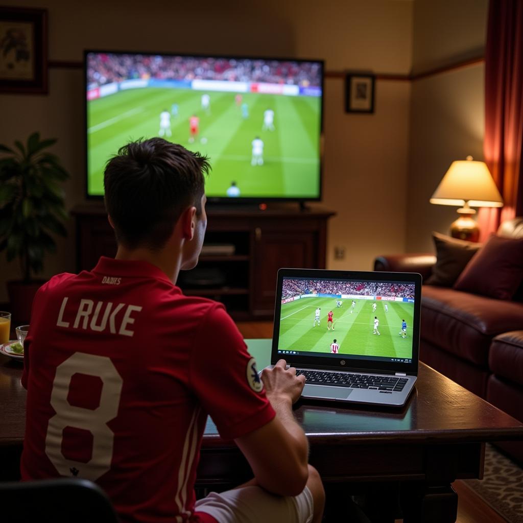 Football fan using HP Pavilion dm4t-1100 to watch a game