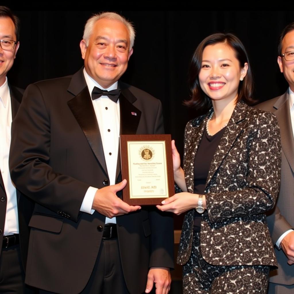 Fan Pei Pei Receiving an Award