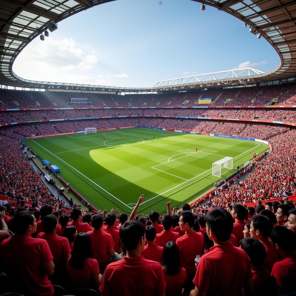 Vietnamese football fans cheering in a modern stadium