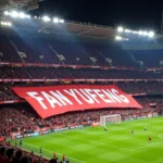 Fan Yufeng banner displayed prominently at a football stadium