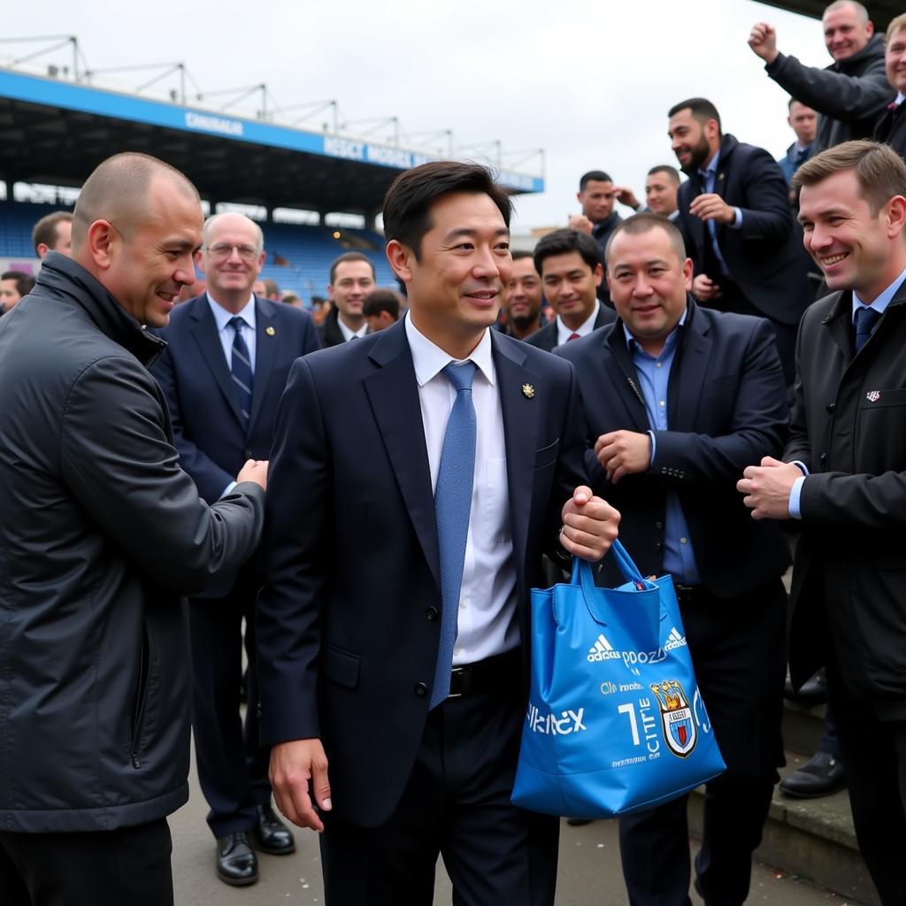 Fan Zhiyi Arriving at Cardiff City