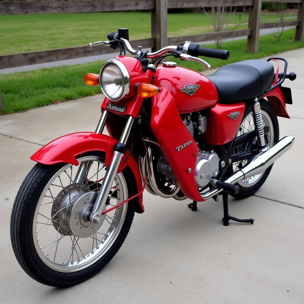 Custom Red Honda Fan 125 Tunada with Chrome Accents