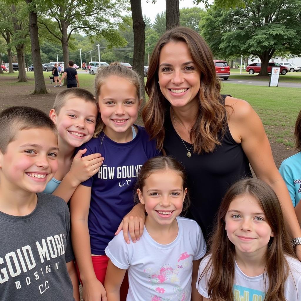 Irina taking photos with her fans