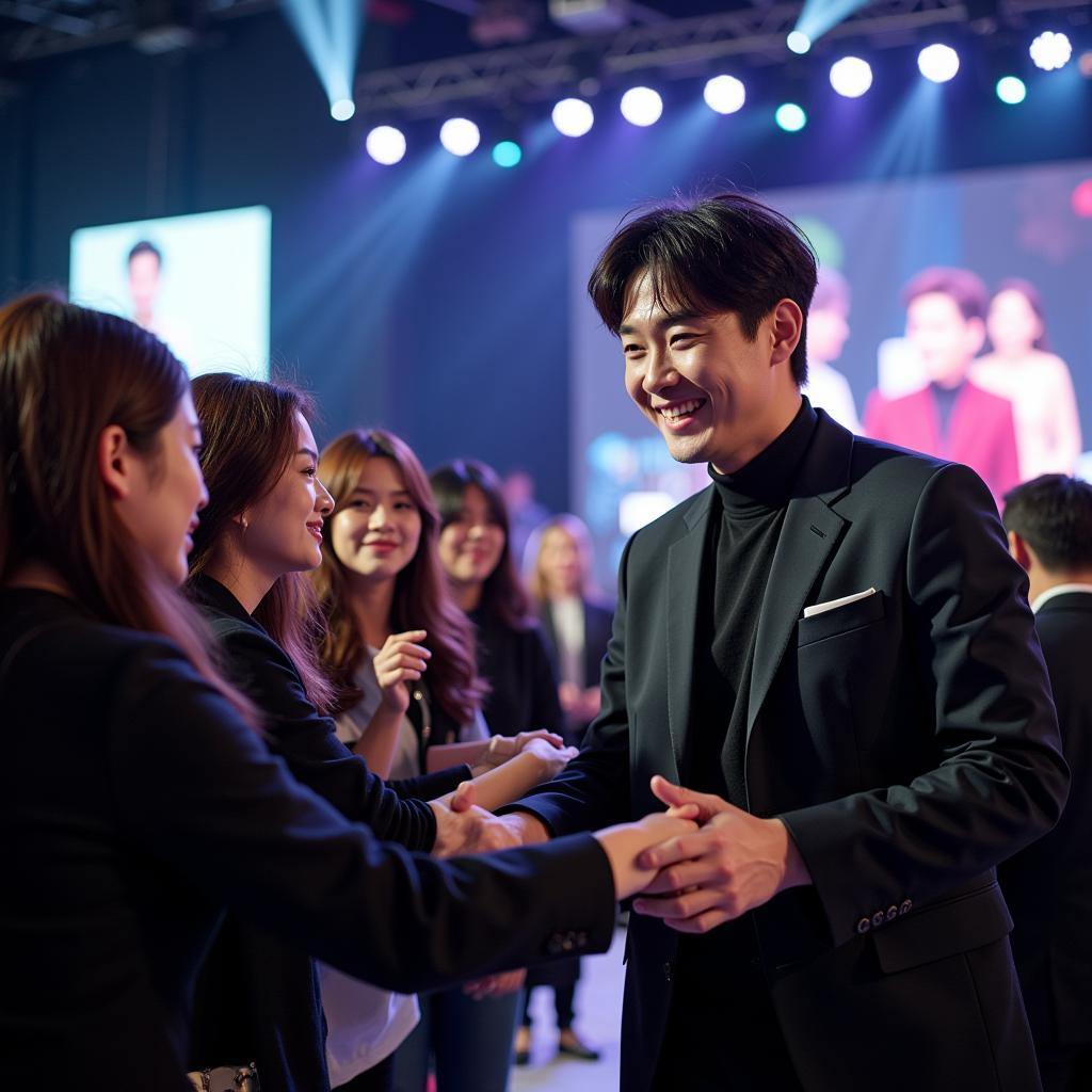 Kim Woo Bin interacting with fans at a fan meeting