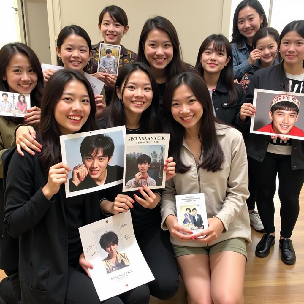 Fans displaying memorabilia from a Nam Joo Hyuk fan meeting