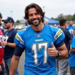 Norman Reedus wearing a Chargers jersey