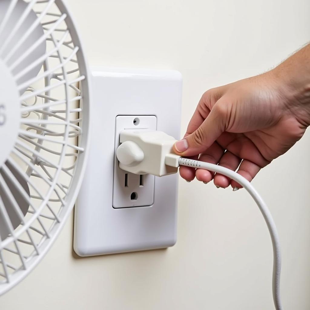 Unplugging a Desk Fan Safely