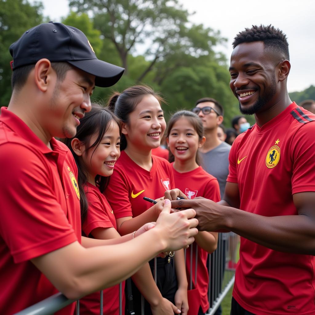 Vietnamese Fans Meeting Their Football Idols: A heartwarming encounter between a fan and their favorite player.