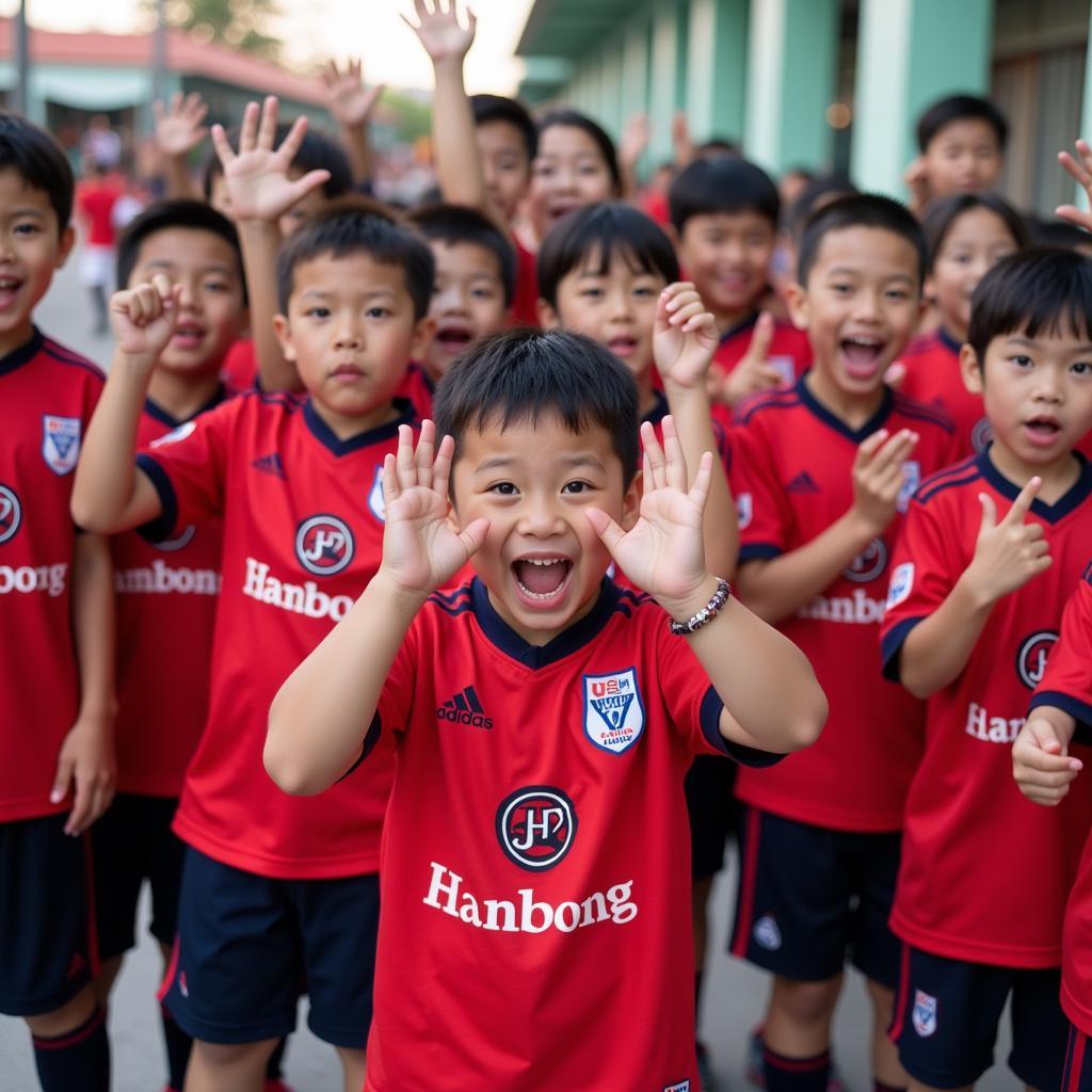 Young Vietnamese fans wearing HSV jerseys