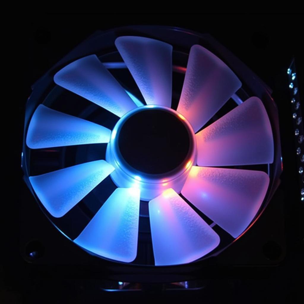 Close-up view of a 40mm LED fan showcasing its vibrant RGB lighting and compact design.