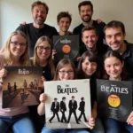 Beatles fans holding their vinyl records