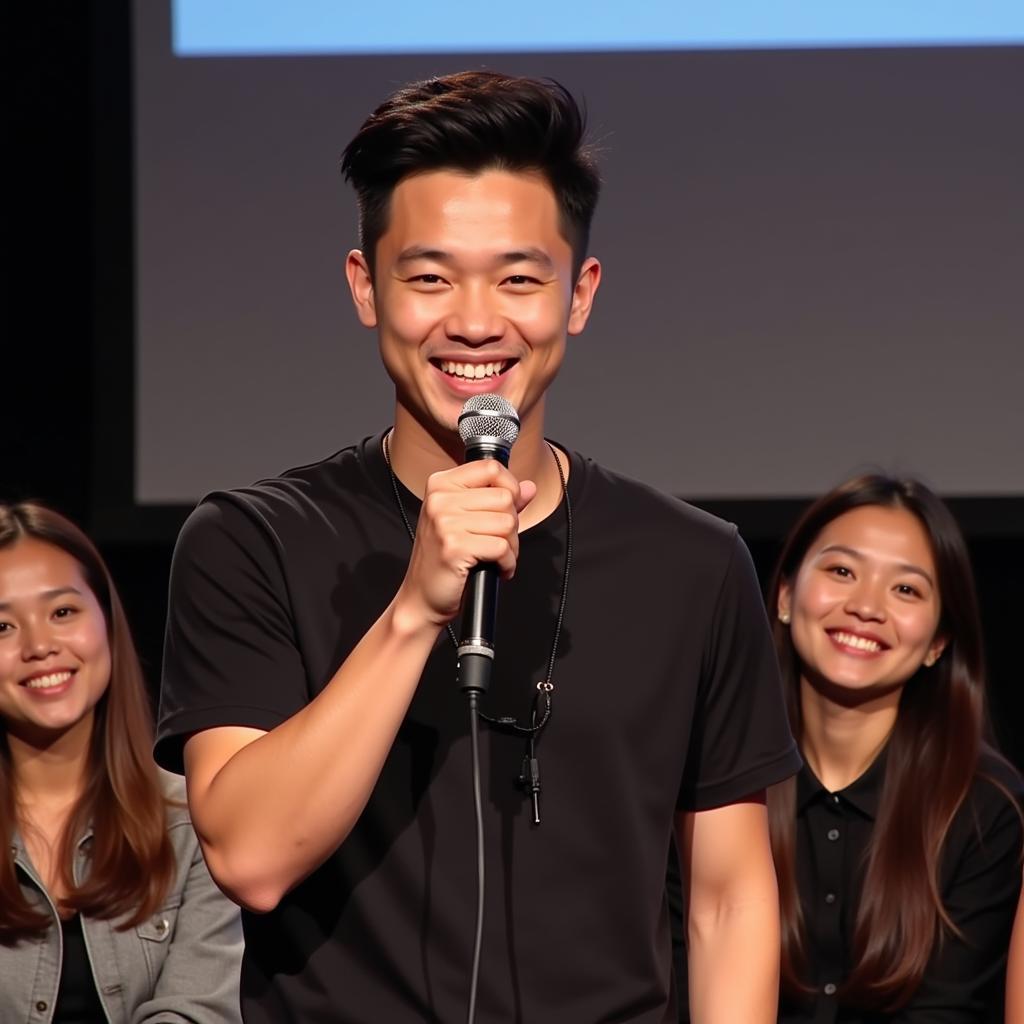 Bùi Anh Tuấn answering fan questions during a Q&A session