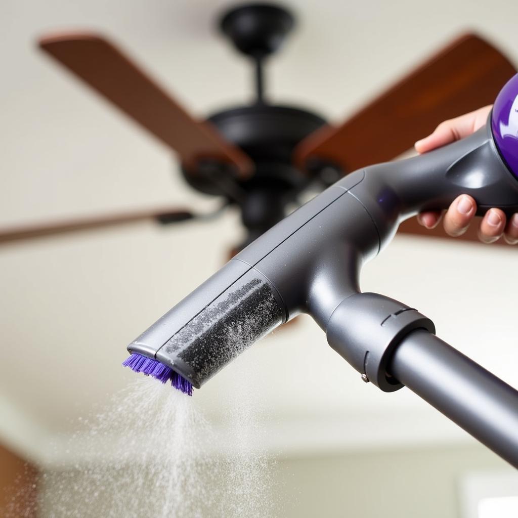 Cleaning Ceiling Fan Blades with a Brush Vacuum Attachment