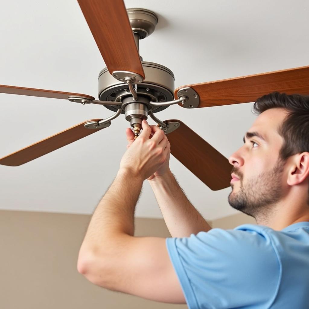 Electrician Installing a Fan