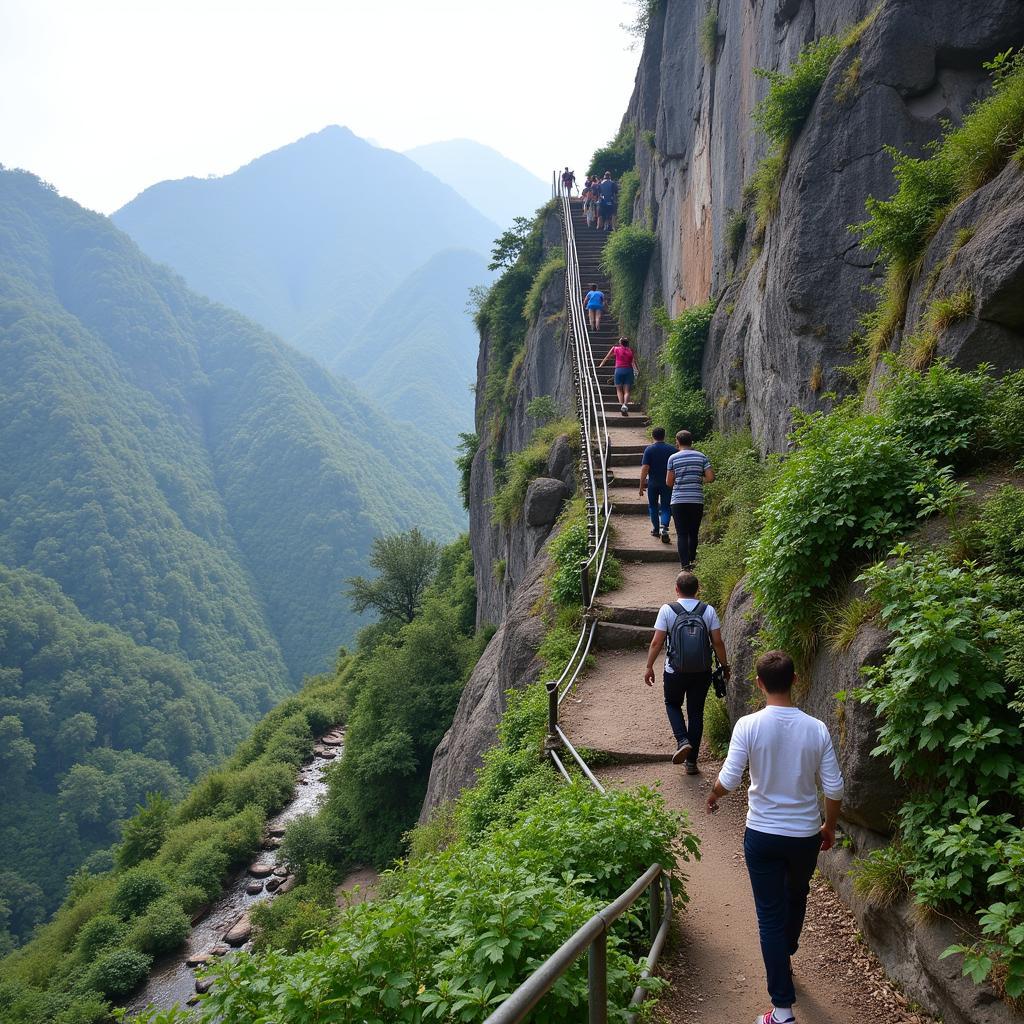 Hikers ascending steep sections of Fan Si Pan using metal ladders bolted to the rock face.