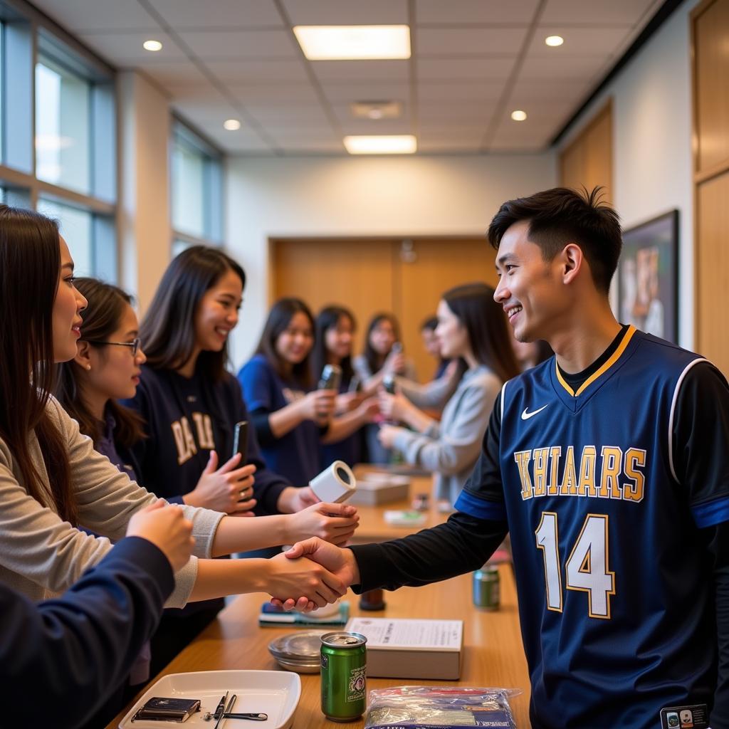 Gil Le interacting with fans at a charity event