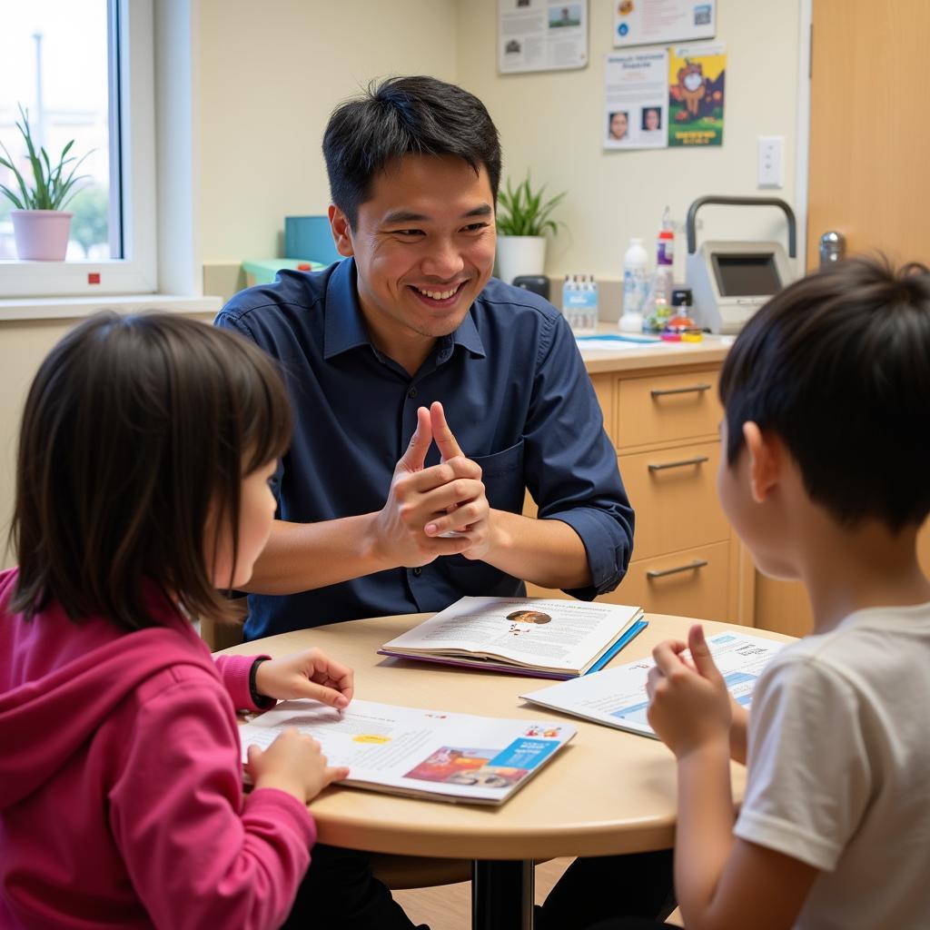 Gil Le visiting children at a local hospital