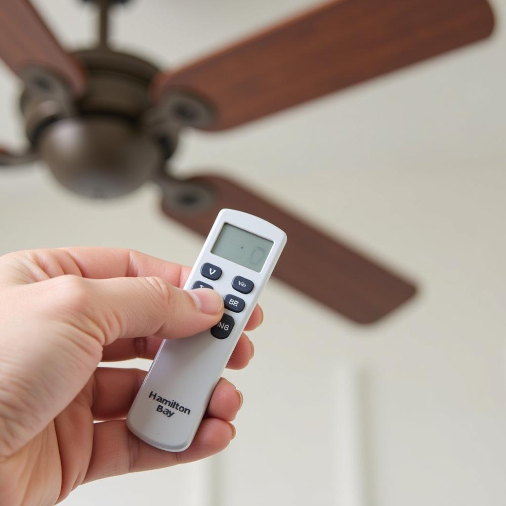 Hamilton Bay Ceiling Fan Remote Control in Hand