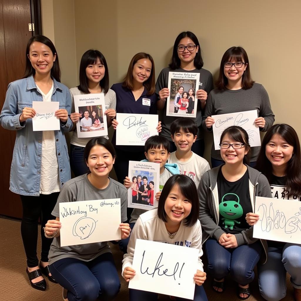 Fans holding memorabilia from Khởi My's 2017 fan meeting