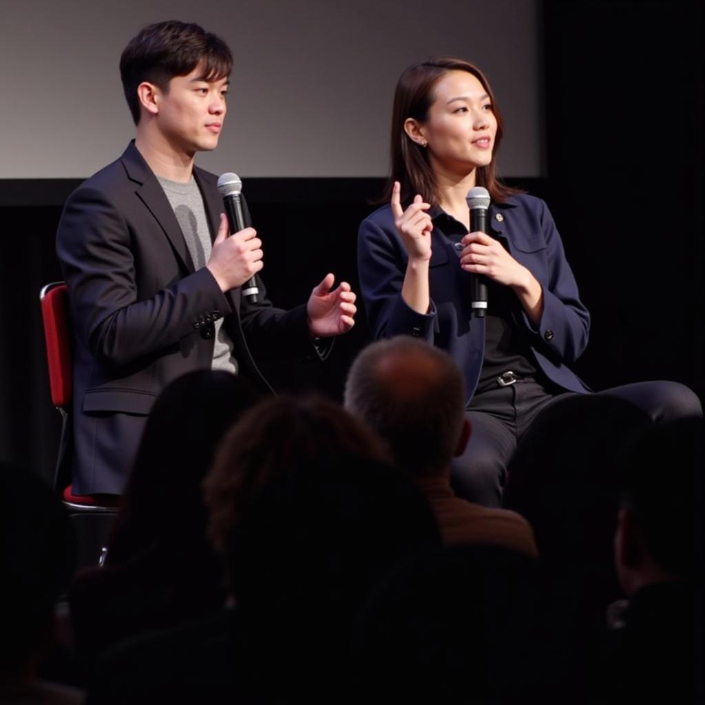 Krist and Singto answering fan questions during the Q&A session