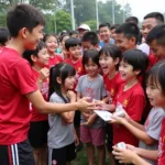 Nam Dinh kids meeting their football heroes