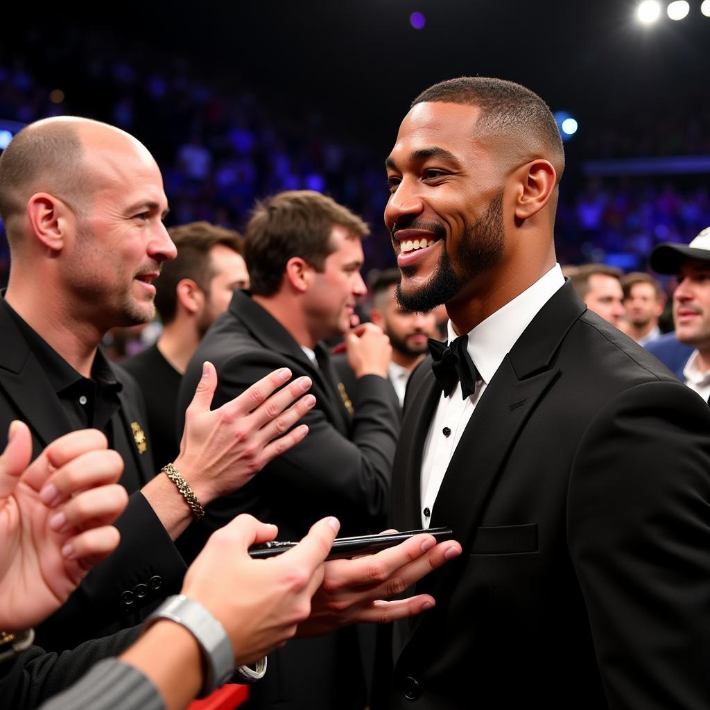 Anthony Joshua interacting with his fans after a match